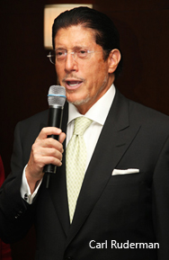 Carl Ruderman Speaking at the Elite Traveler Celebration.