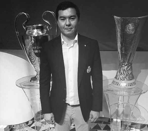 Nurali Aliyev at the UEFA Club with the Trophies. 2018. Photo by Instagram.